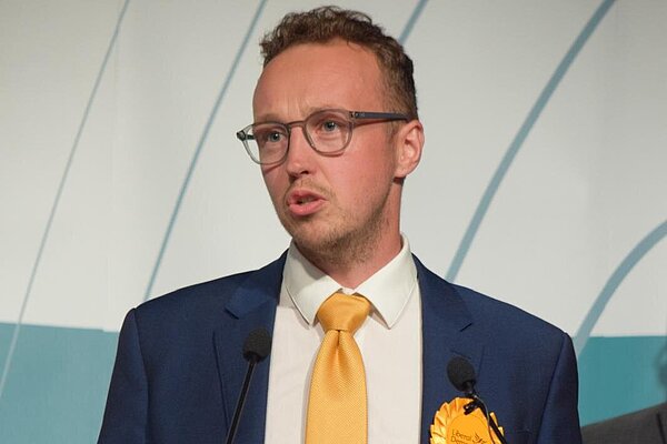 adam podium